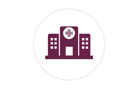 Landeskrankenhaus Großschweidnitz Icon: stilisierte Darstellung eines Krankenhausgebäudes mit einem medizinischen Kreuz auf der Fassade. Symbol für stationäre Versorgung und Kliniken