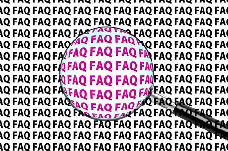 A magnifying glass points to a page full of FAQ letters