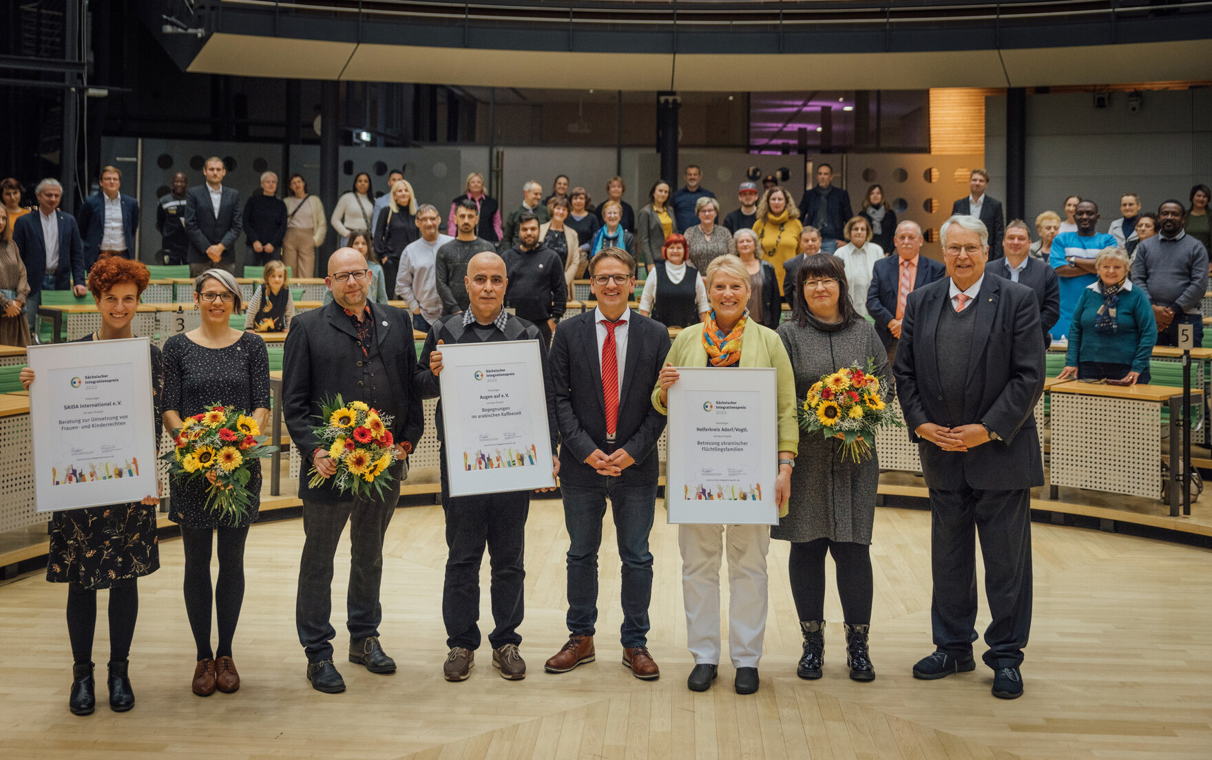 Gruppenbild der drei Preisträger des Sächsischen Integrationspreises 2022