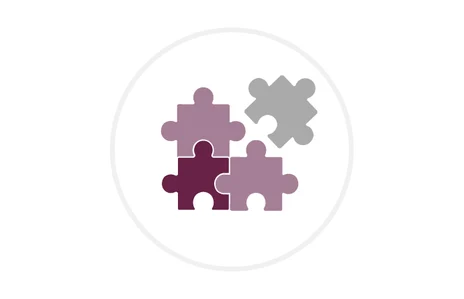 Icon: vier stilisierte Puzzleteile, die ineinander greifen. Symbol Zusammenhalt